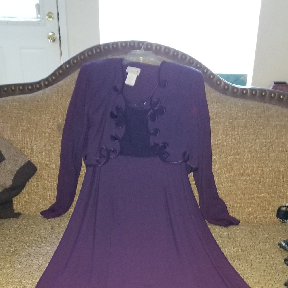 Sleeveless dress with long sleeve crop length jacket